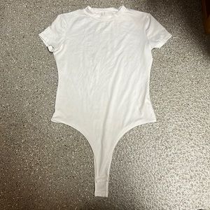 short sleeve white body suit size small